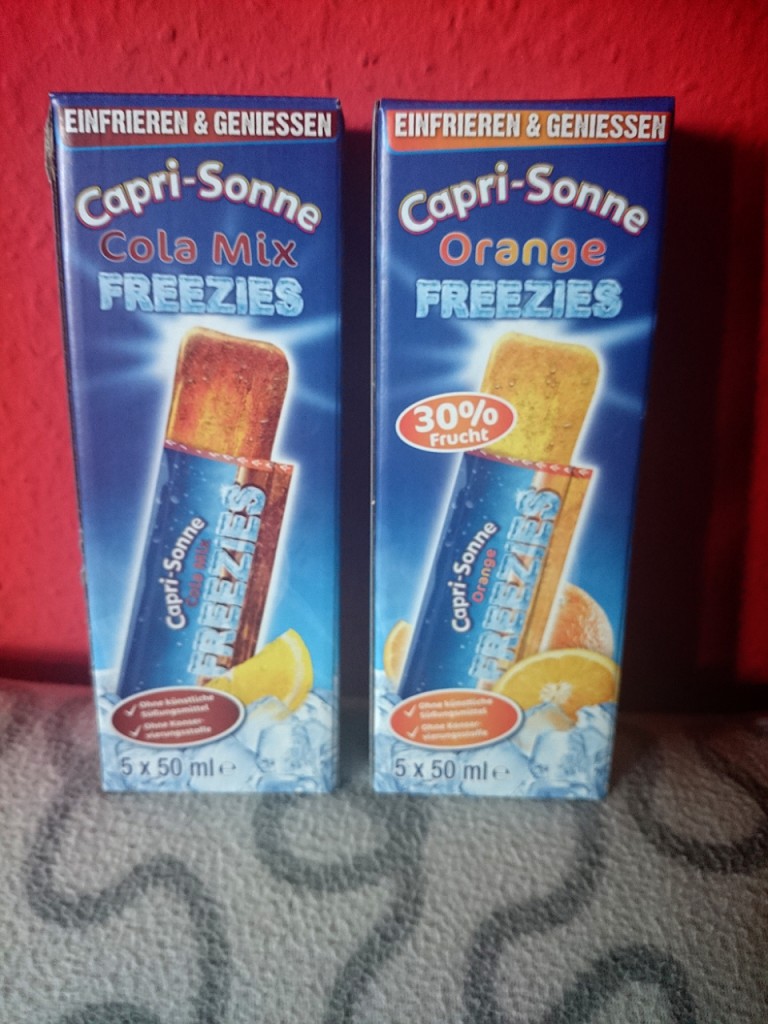 CAPRI-SONNE “Freezies Cola-Mix und Orange”